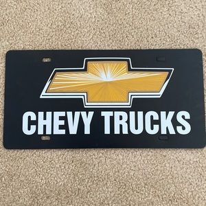 CHEVY Trucks Plastic License Plate. Few scratches on back see photos.
